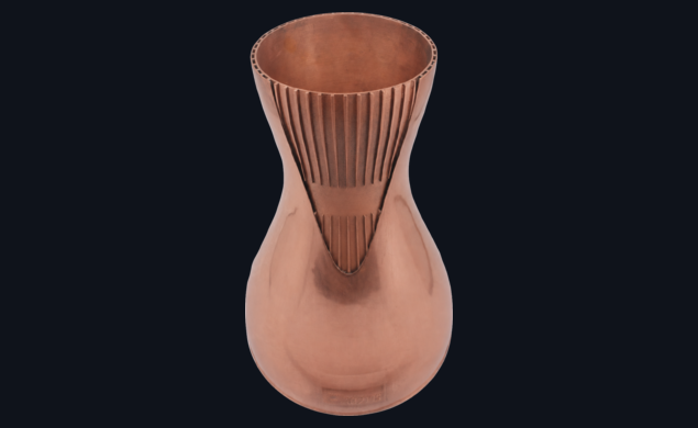 Additively manufactured copper nozzle with fine external flow features